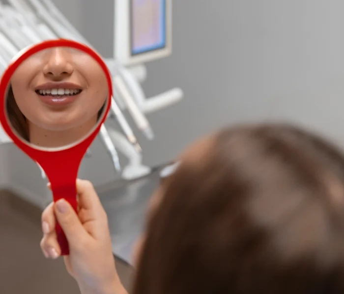 close-up-dentist-using-instruments